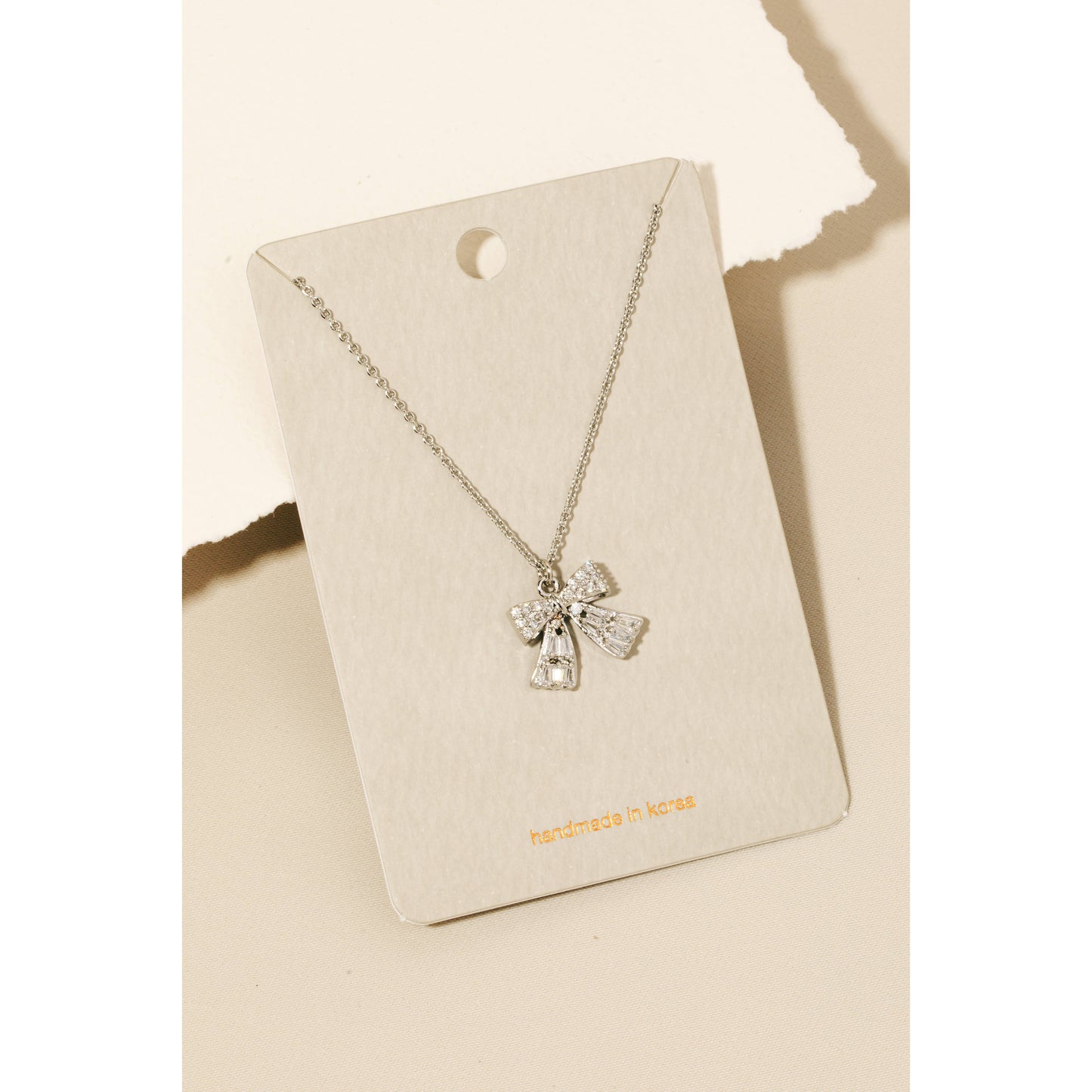 Rhinestone Ribbon Bow Pendant Necklace, Silver